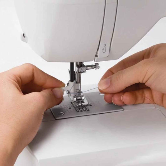 How do I thread my Sewing Machine?