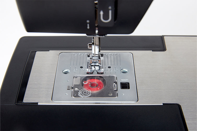 Inserting a Top Drop-In Bobbin