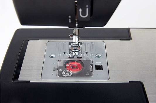 Inserting a Top Drop-In Bobbin