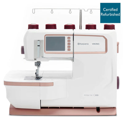 HUSQVARNA® VIKING® Refurbished AMBER™ Air S | 600 Coverlock Machine -- Product Image