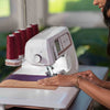HUSQVARNA® VIKING® Refurbished AMBER™ Air S | 600 Coverlock Machine -- Product Image