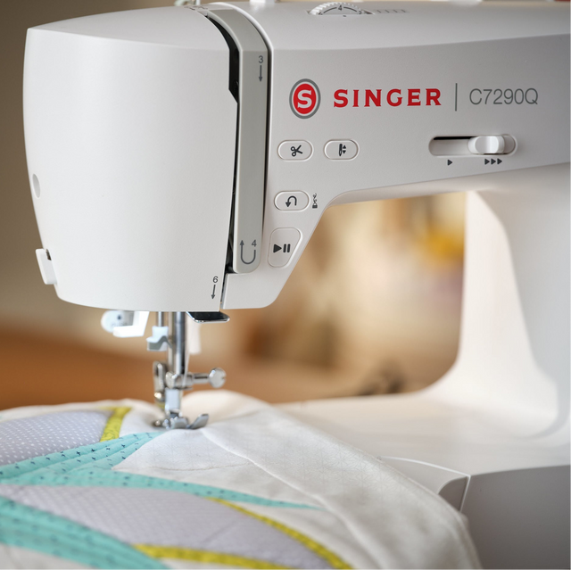 Close-up of the Singer C7290Q sewing machine, featured in a comparison with the Brother CS600I sewing machine.